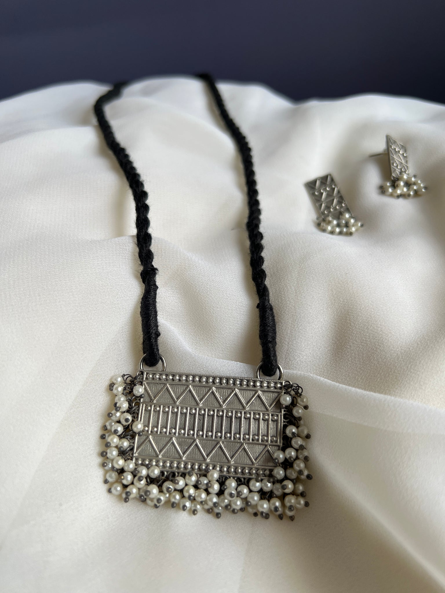 Oxidised pendant black thread with studs