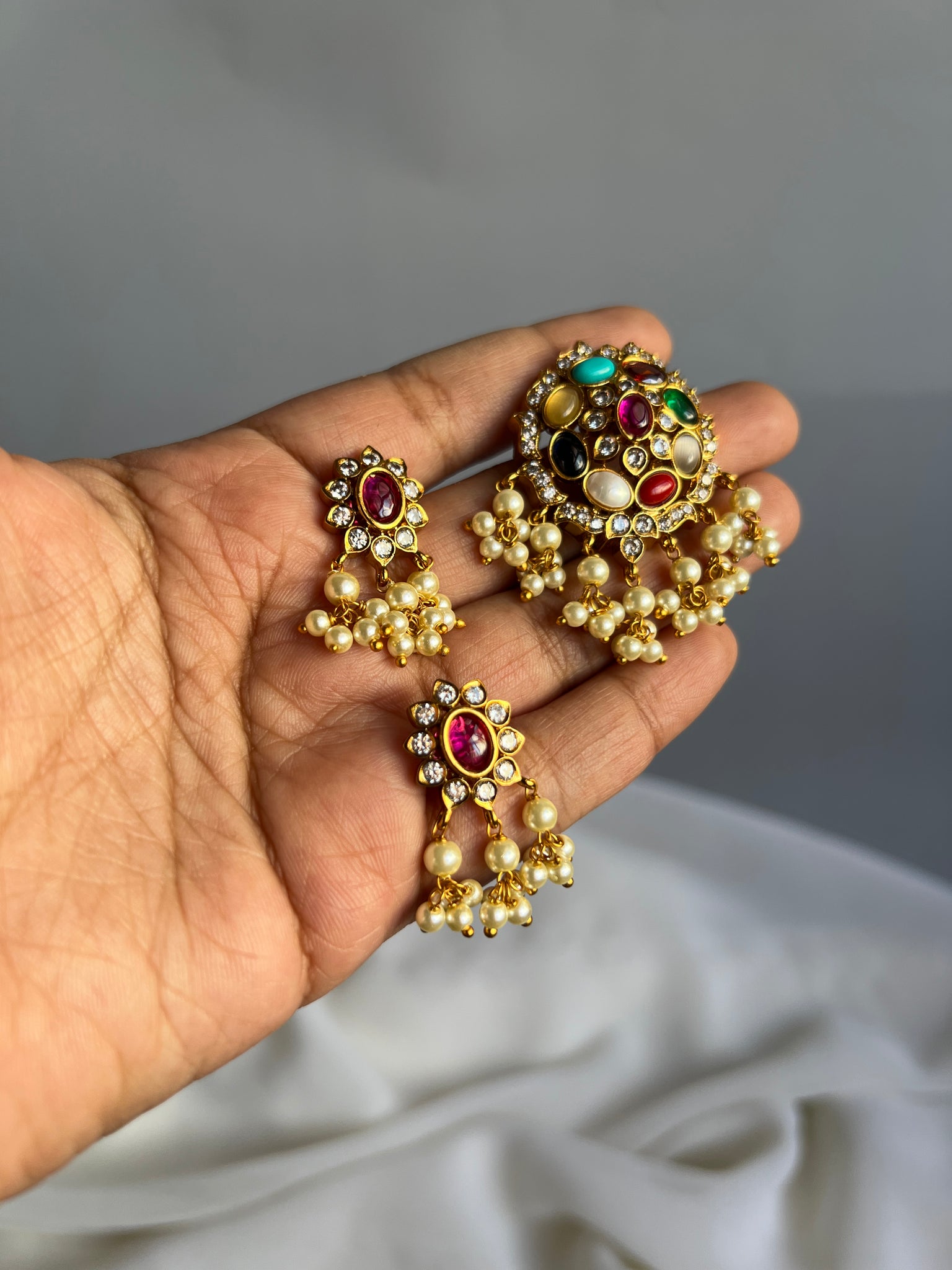 Navaratna stone pendant with studs