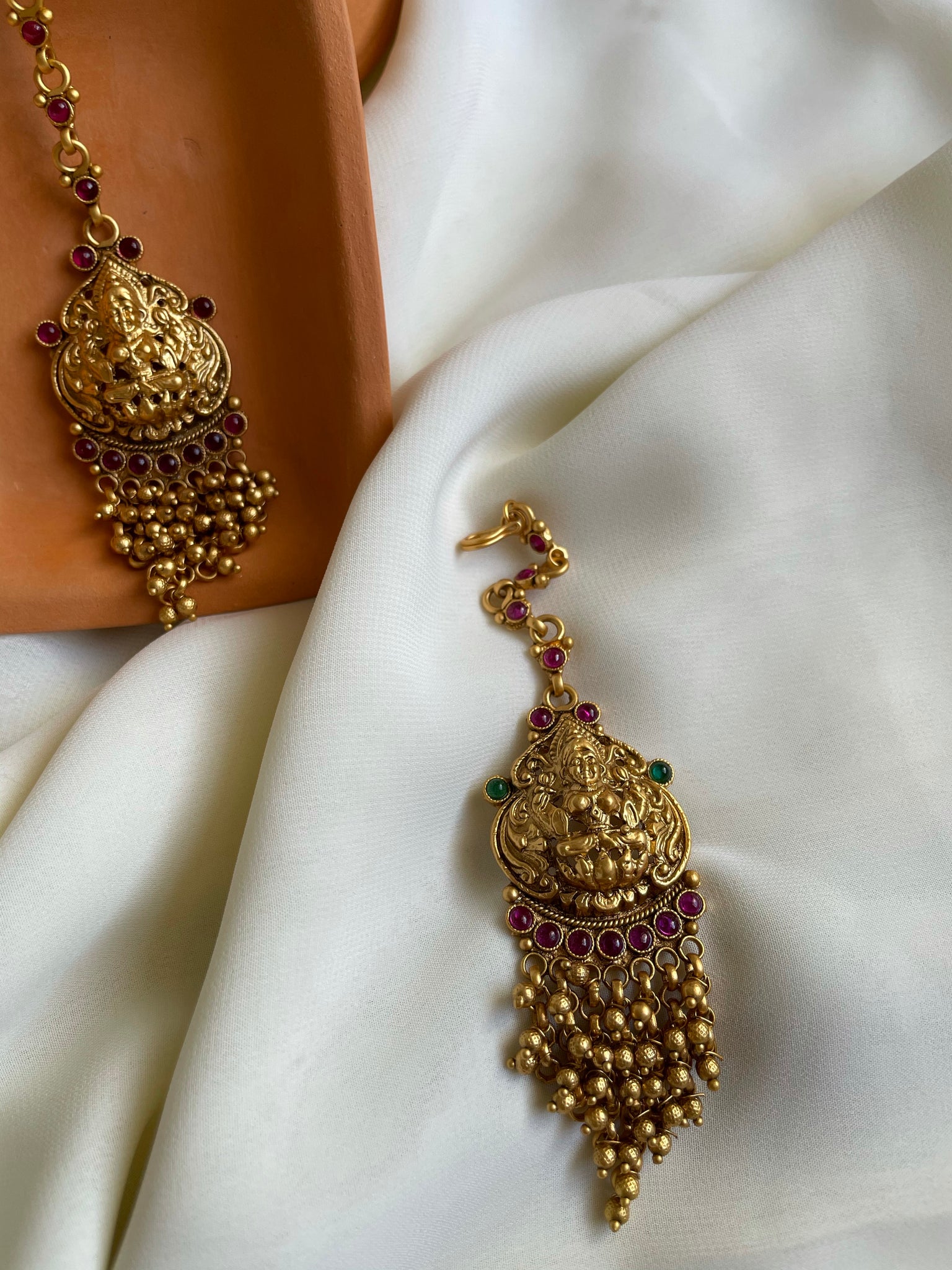 Temple gungaroo tassel tika