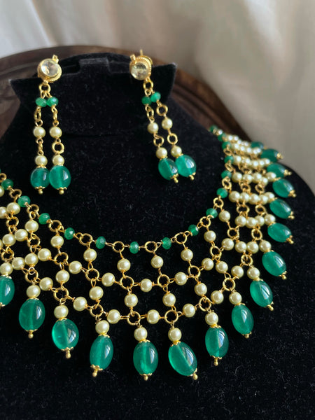 Jaali worked bead necklace with Kundan studded earrings