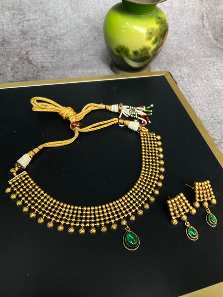 Antique designer necklace with studs