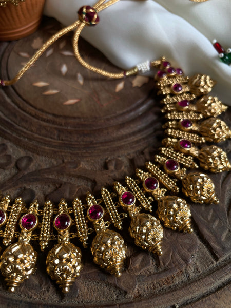 Ruby antique gold like necklace with Jhumkas