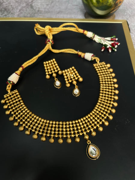 Antique designer necklace with studs